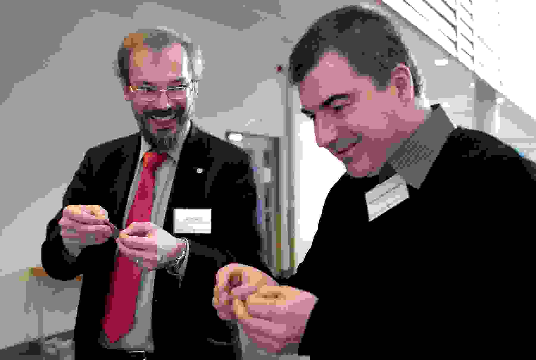 Graphene Flagship Director, Jari Kinaret, and Nobel Laureate Konstantin Novoselov recreate the original “sticky-tape experiment” by which graphene was first isolated. Credit: Graphene Flagship